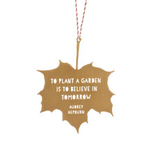 'To plant a garden' quote leaf ornament product photo