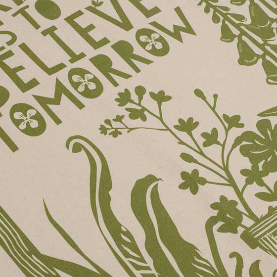 'To plant a garden' quote apron product photo front L